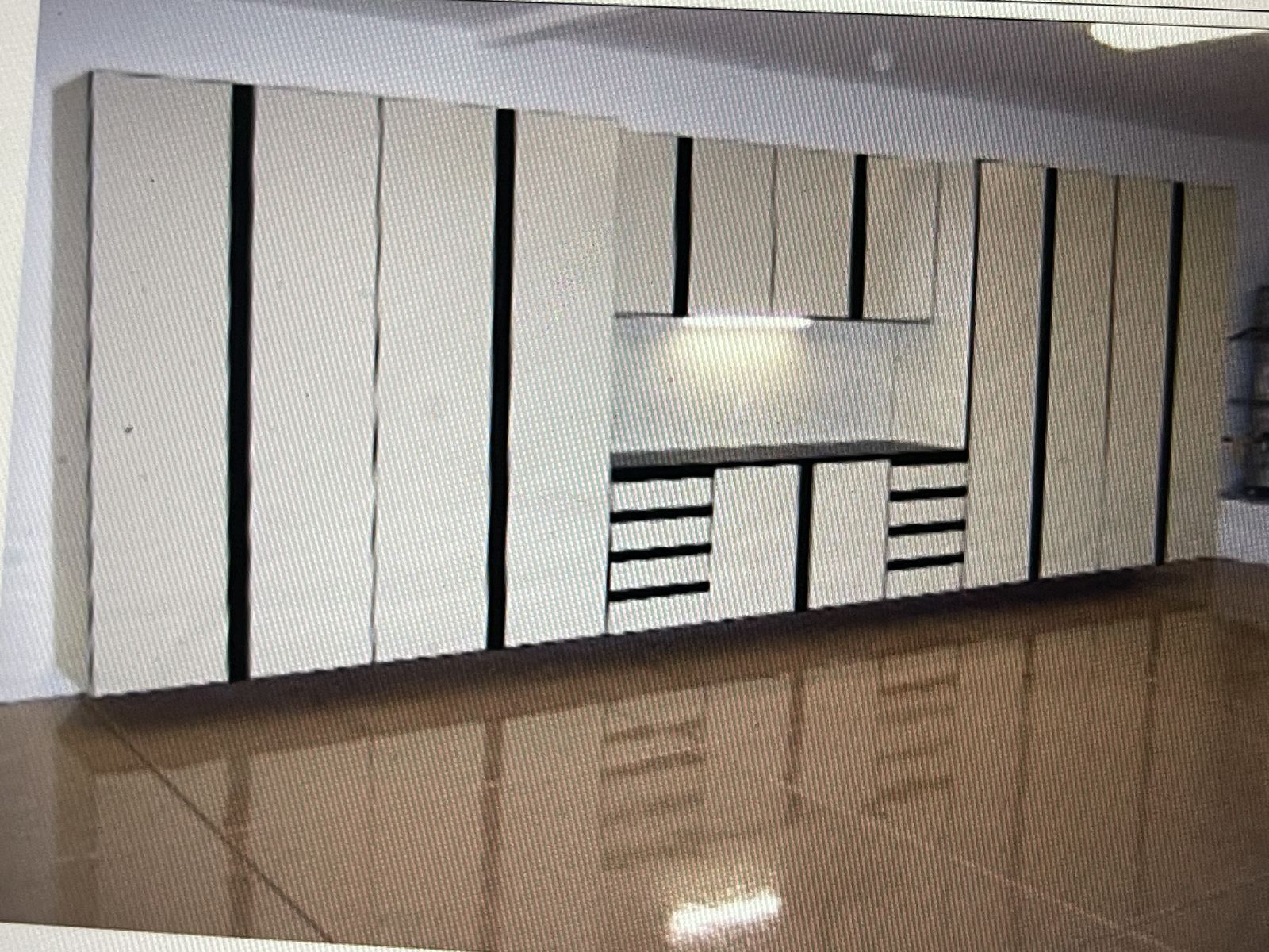 White custom garage cabinet run with metallic epoxy floor