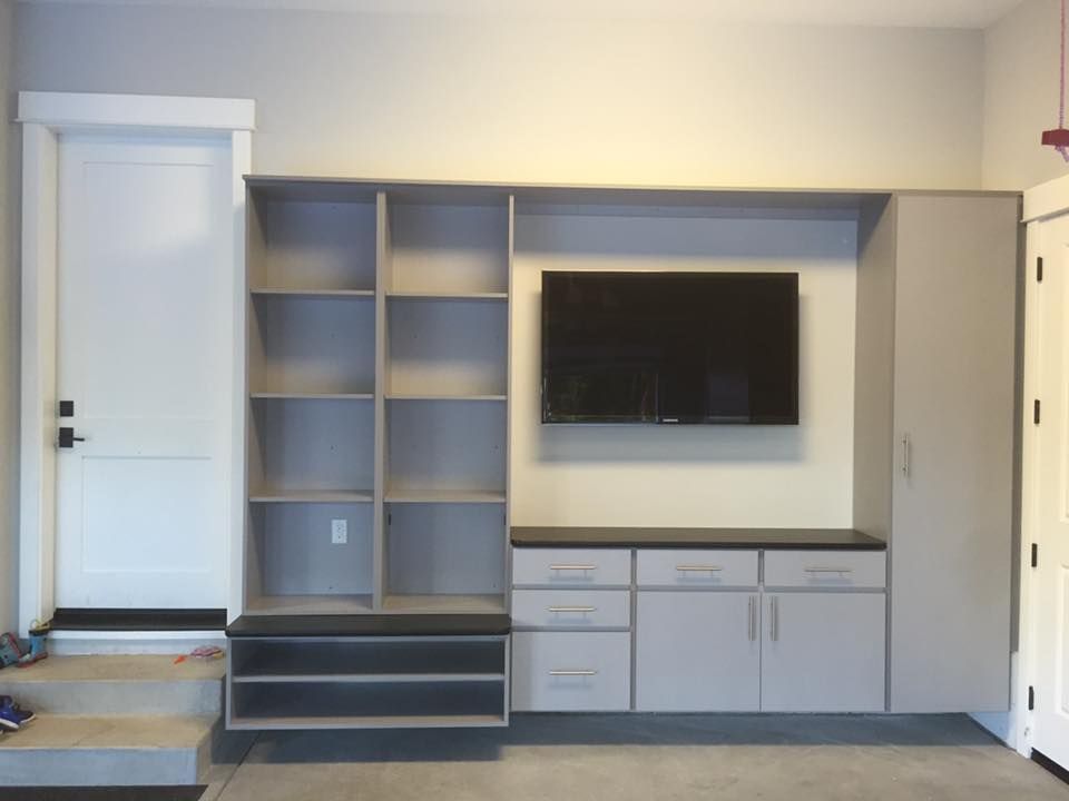Built-in media wall with TV nook and cabinets